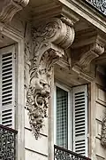 No&nbsp;56 : console à tête de lion supportant le balcon du second étage.