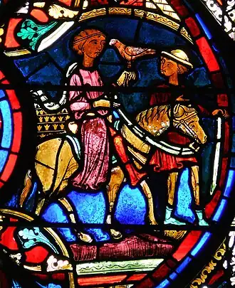 Le damoiseau dans le vitrail de l'Enfant prodigue