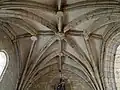 La voûte en étoile de la dernière travée du bas-côté nord