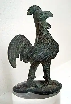 Travail du bronze, coq miniature.