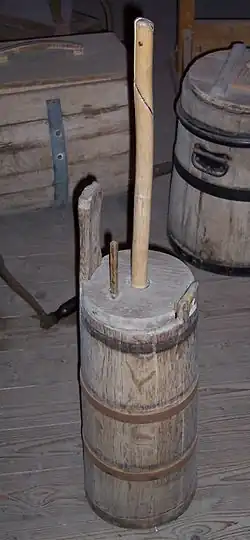 Baratte verticale à batte.