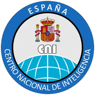 un logo de couleur bleu avec les emblèmes de l'Espagne au centre