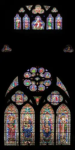 Verrière d'axe : saint Laurent, le Christ, la Vierge Marie, saint Génulphe.