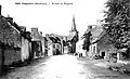Campénéac ː l'entrée du bourg par la route de Beignon au début du XXe&nbsp;siècle (carte postale).