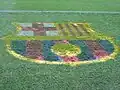 Logo du Barça sur le terrain de jeu