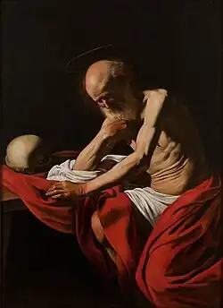 Peinture. Un vieil homme à la toge rouge médite dans une cellule obscure.