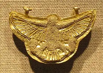 Pendentif en représentant un faucon.