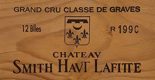 Estampe d'une façade de caisse en bois du millésime 1990.