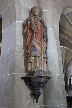 Statue de saint Martial (XVe), polychrome en pierre calcaire, église de Chamboulive.