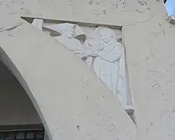 Fille de la charité présentant un nouveau-né à Vincent de Paul