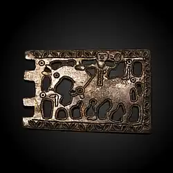 Boucle de ceinture (thème chrétien) en bronze, avant le VIIe&nbsp;siècle.