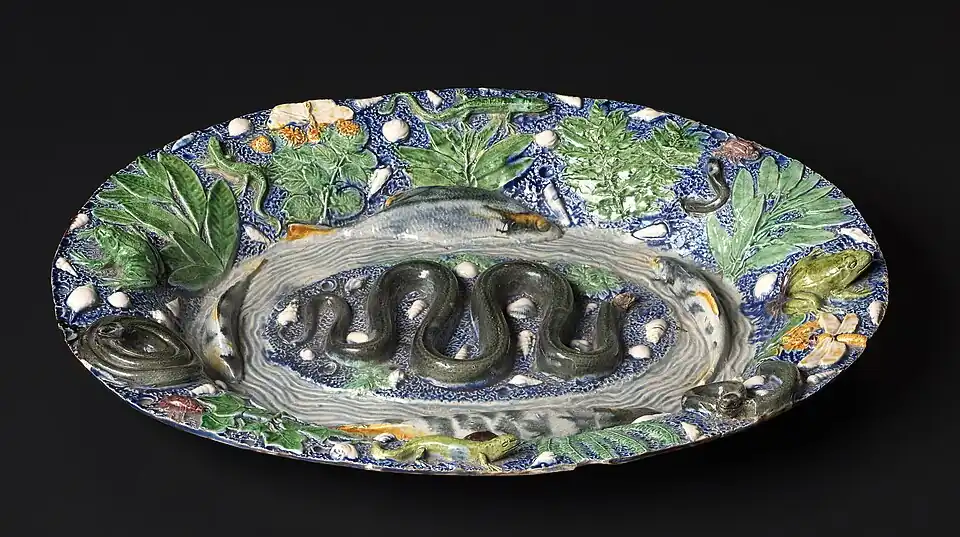 Bassin « rustique », attribué à Bernard Palissy. Fin du XVIe début du XVIIe&nbsp;siècle. Terre vernissée, moulages sur nature, glaçures plombifères. Paris, musée du Louvre.