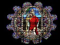 Rosace représentant saint Christophe et l'Enfant Jésus.