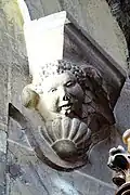 Chapelle latérale sud, 1re travée, cul-de-lampe dans l'angle nord-est.