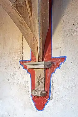 Console détachée d'un mur et portant un départ d'ogives.