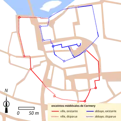 Carte en couleurs représentant le tracé d'enceintes sur le plan d'une ville.