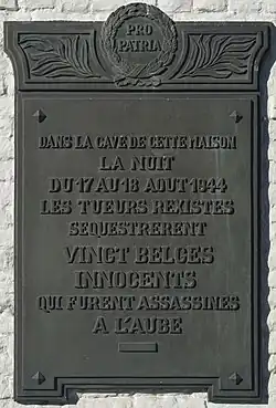 Plaque apposée sur la maison où furent détenues les victimes.
