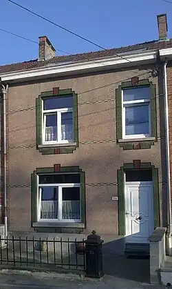 Façade en cimorné.