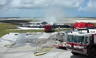 Photographie des restes calcinés du Spirit of Kansas après son accident.
