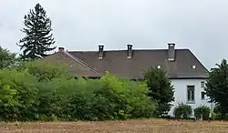 Photographie d'un bâtiment ancien rénové.