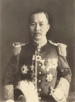 Description de l'image Den Kenjiro (as Minister of Communications).jpg.