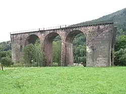 Photographie d'un pont inachevé pour une ligne ferroviaire entre Bussang (Lorraine) et Urbès (Alsace)