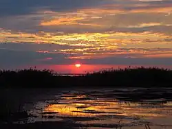 Pendant un coucher de soleil.