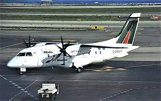 Un Dornier 328 de :Minerva Airlines&nbsp;(en), similaire à celui impliqué dans l'accident.