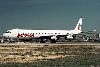 C-GMXQ, le Douglas DC-8 impliqué dans l'accident, ici à l'aéroport de Faro en novembre 1988.