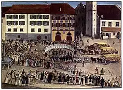 Peinture montrant une fête sur une grande place avec des chariots remplis de céréales.