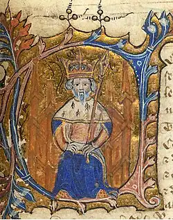 Enluminure représentant un roi assis sur son trône, avec sa couronne et son sceptre.