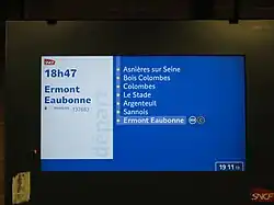 Écran annonçant le train de 18h47 pour Ermont Eaubonne, et affichant qu'il est 19h12.