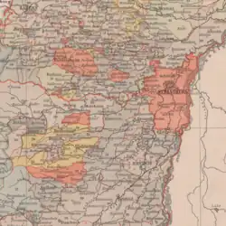 Carte géographique représentant des rivières, une ville et des villages colorés en bleu, en jaune ou en orange.