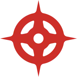 Symbole rouge constitué d'un rond et d'une étoile à quatre branches superposés.