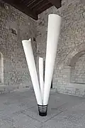 Emmanuel Régent, Mes plans sur la comète, 2006, papier, corbeille, plombs de plongée. Vue de l'exposition Sortir de son lit en parlant d'une rivière, 2012, CAC Château des Adhémar, Montélimar