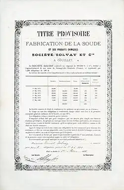 Certificat global de 100 obligations n° 1-100 de 500 francs chacune de la Société Solvay & Cie, émises le 1er mai 1874 à Ernest Solvay et signées de sa propre main en tant que gérant principal. L'emprunt d'un total de 600.000 francs, portant intérêt à 6%, a été contracté pour la réalisation d'une usine à Dombasle-sur-Meurthe.