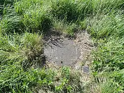 La tête de puits matérialisée.