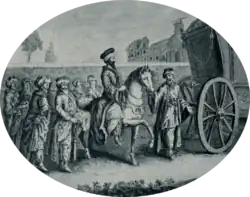 Cortège d’hommes enturbannés qui  entourent un seul cavalier. Un carrosse les précède.