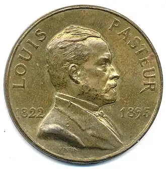 Monnaie de 1/10e d'Europa, portrait de Louis Pasteur (1928), bronze, 32&nbsp;mm.