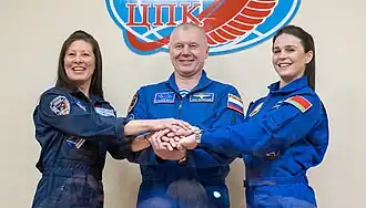 De g. à d. : Tracy Caldwell, Oleg Novitski et Marina Vassilievskaïa