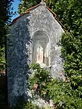Niche d'un oratoire dédié à Marie.
