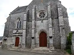 Portails d'entrée et rosace de la façade ouest.