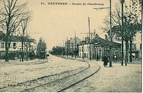 La RN 13 dans les premières années du XXe&nbsp;siècle. Les rails sont ceux du tramway Paris - Saint-Germain qui circula de 1890 à 1935.
