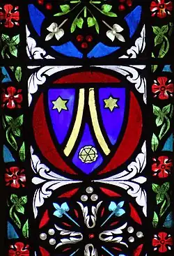 Vitrail avec le blason de la famille d'Artigues