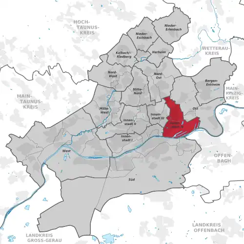 Carte situant l'arrondissement (en rouge) au sein du reste de la ville (en gris)