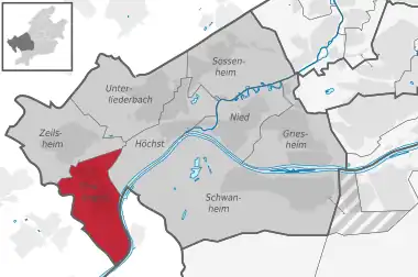 Carte situant le quartier (en rouge) au sein l'arrondissement (en gris foncé) et du reste de la ville (en gris clair)