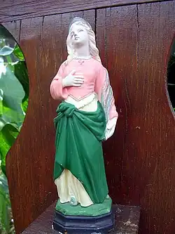 Statuette de sainte Quitterie sur le site de la fontaine
