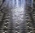Détail du pavement avec le fil.