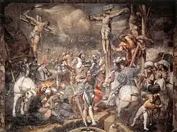 Image d'une peinture décrivant sur fond de ciel sombre, au centre de la scène un lansquenet, se tourne vers le spectateur, en pointant la croix de Jésus, dans une position asymétrique entre les deux croix des voleurs. Une série de cavaliers et une foule de personnages animent la scène de manière chaotique avec en bas à gauche la Vierge évanouie parmi les femmes pieuses.