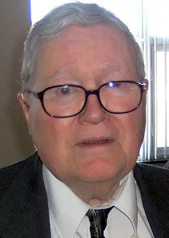 Photo couleur d'un homme.